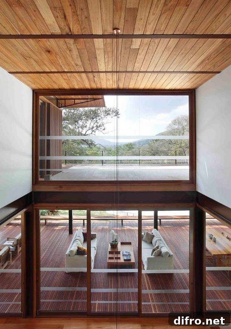 View of the deck and the landscape from the upper level of the house