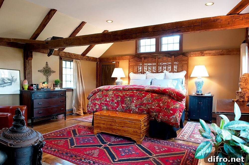 Cozy farmhouse bedroom where wooden beams shape the design