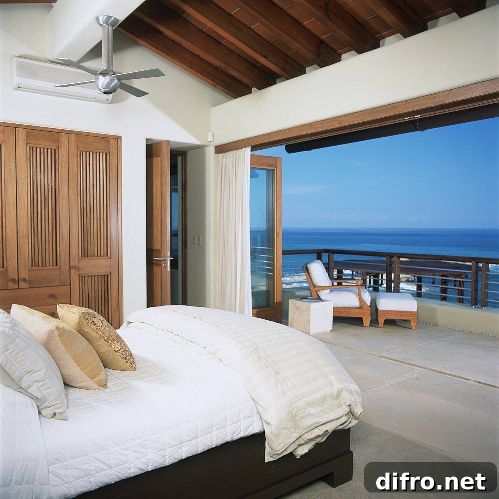 Tropical-style vacation home bedroom with beams and outdoor connection