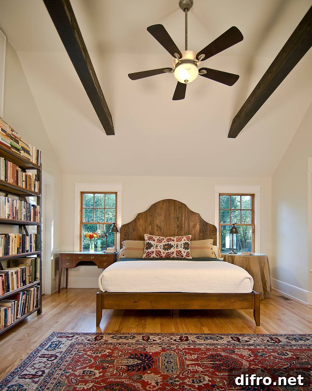 Bedroom with striking dark wooden beams for classic contrast