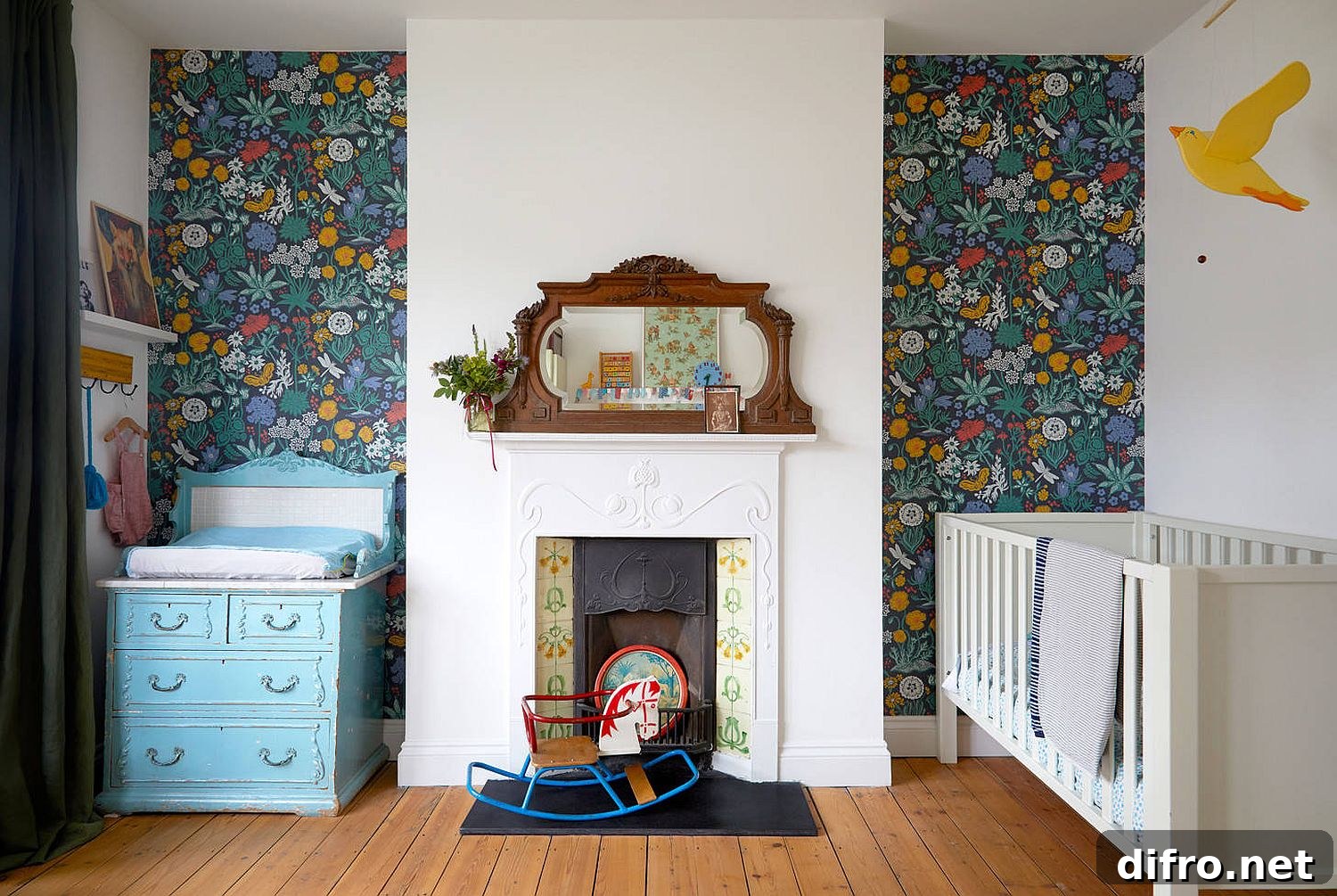 Colorful wallpapered backdrop for small eclectic nursery