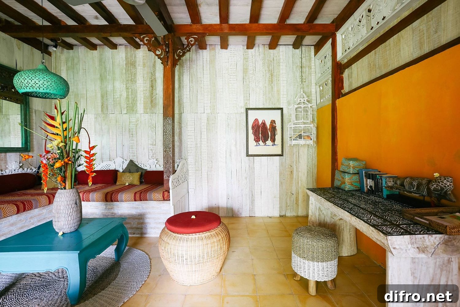 Yellow accent wall in tropical room