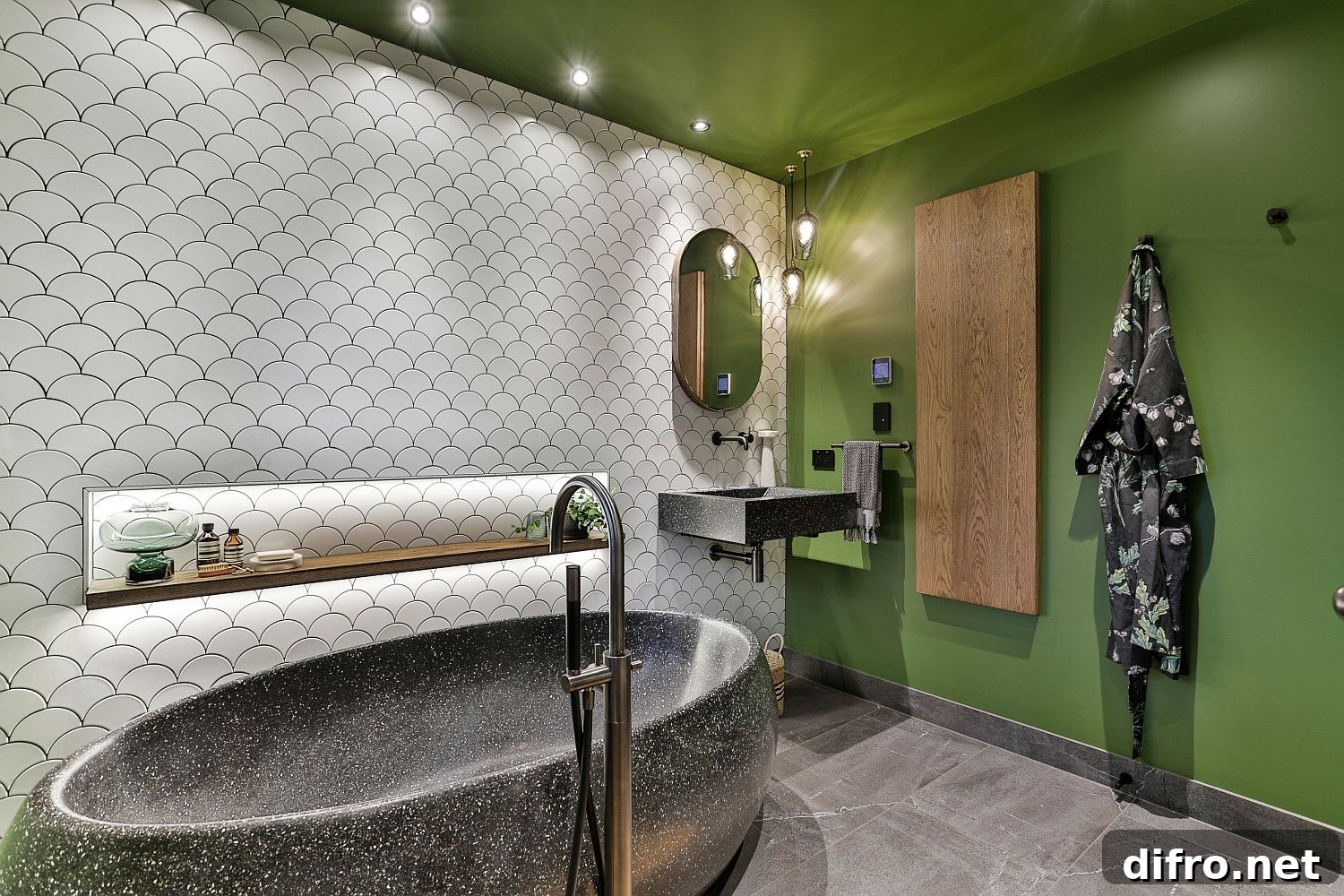 Stone bathtub in a green bathroom