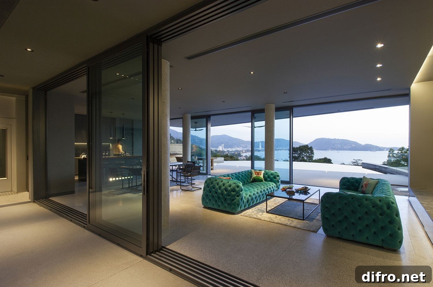 Colorful sofas in open-plan living area