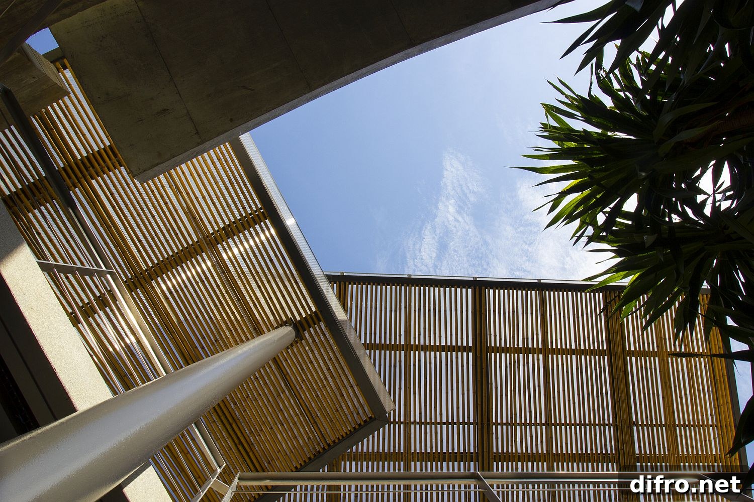 Moving bamboo shades positioned inside the house