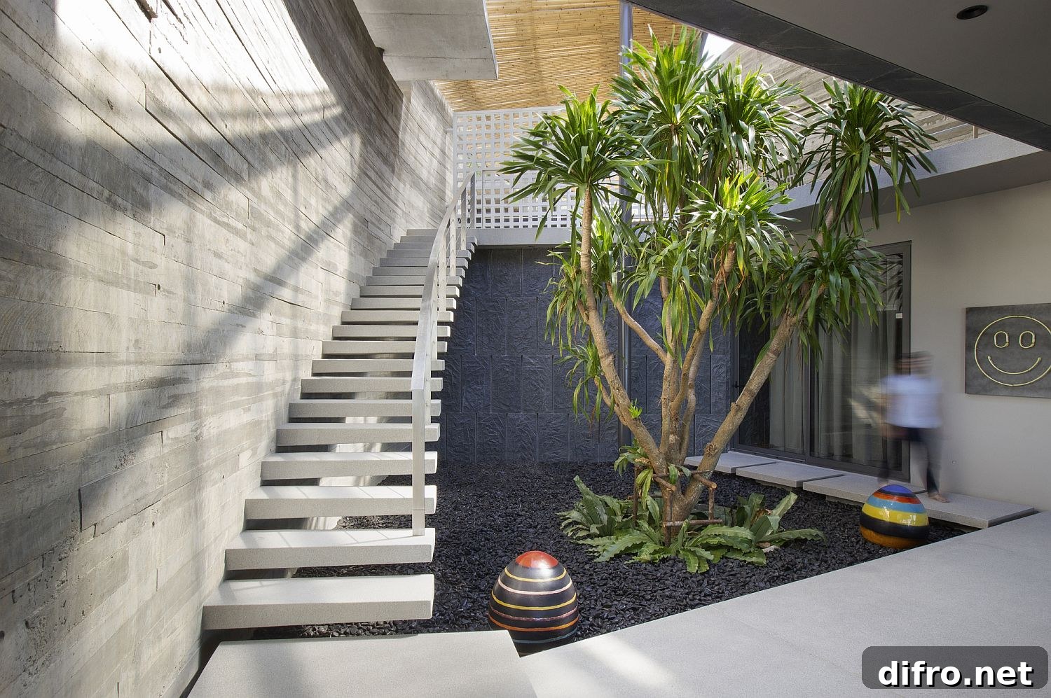 Staircase to lower living areas and courtyard
