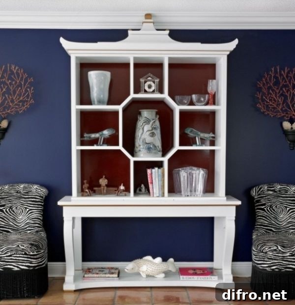 Room with Classic Blue accent wall and white shelving