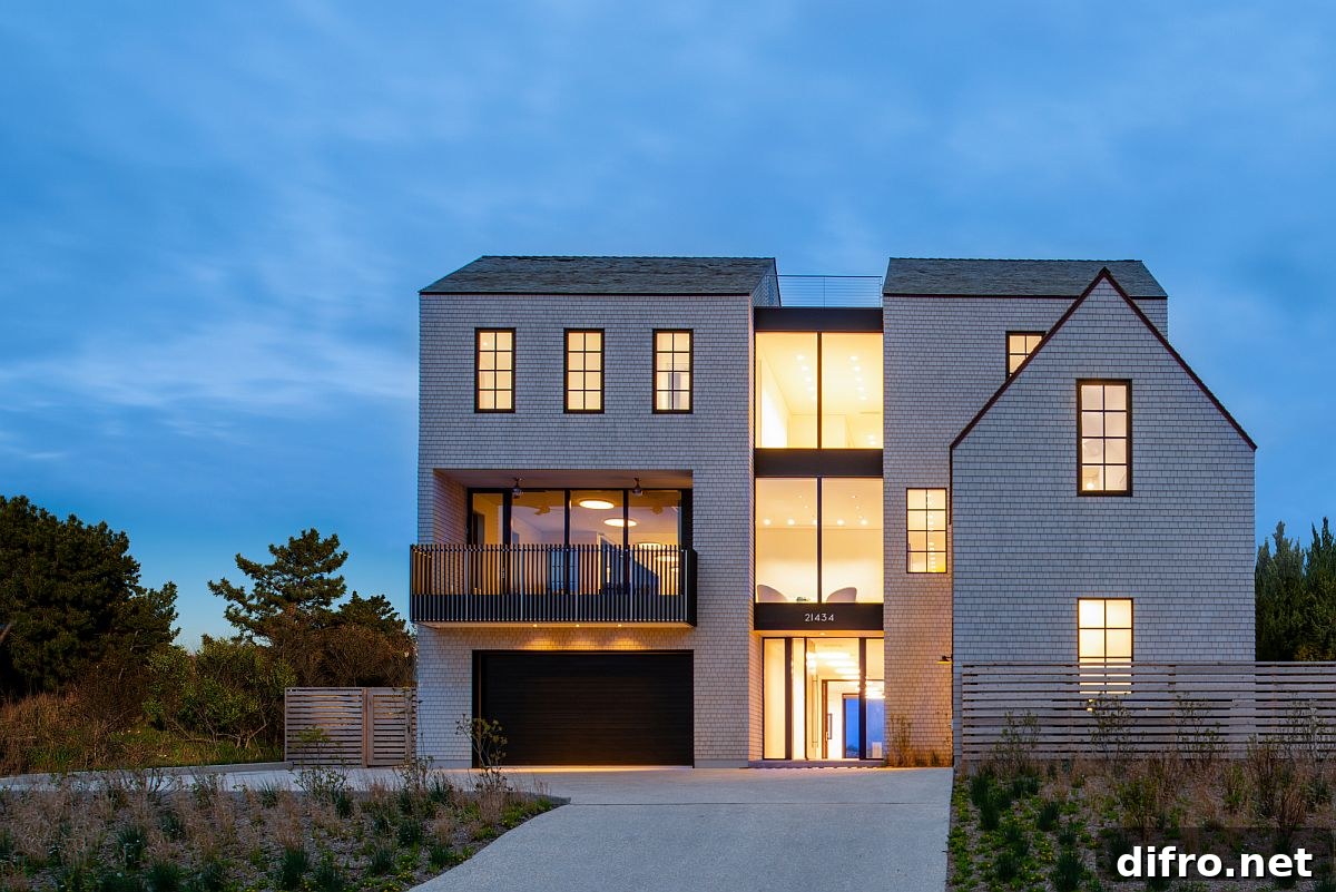 Warm lighting illuminates the vacation house after sunset