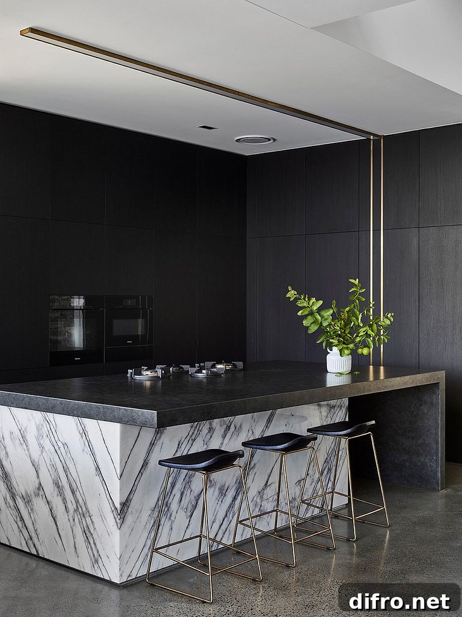 Marble with dark finishes for a curated kitchen look