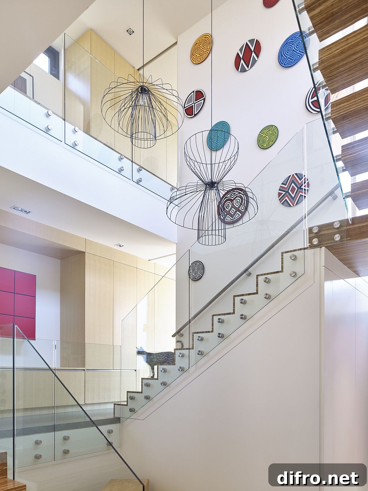 Light-well and staircase with a splash of color