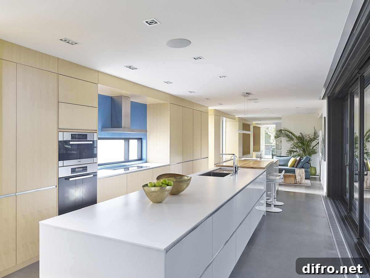 Wood and white kitchen with sliding glass doors