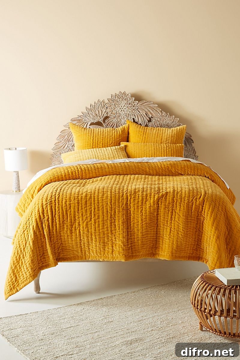 Buttery beige bedroom with velvety saffron bedding