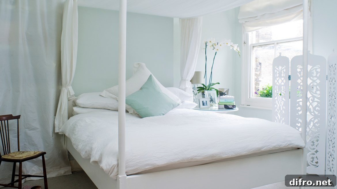 Pavilion Blue bedroom with white trim and textiles