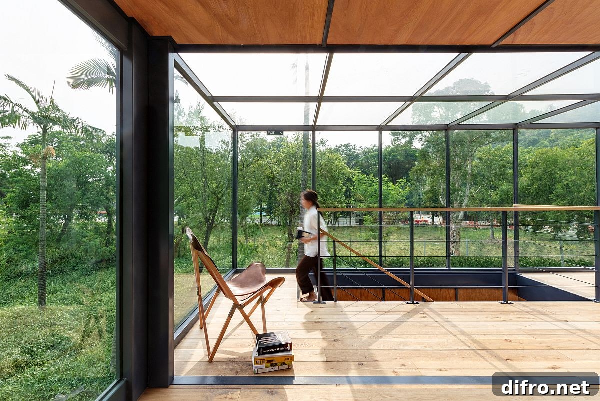 Open glass enclosures on upper level with glass ceiling that completely welcome the outdoors inside