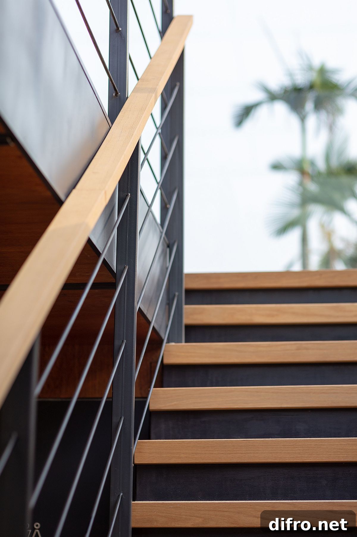 Wood and steel staircase inside the marketing suite feels simple and industrial