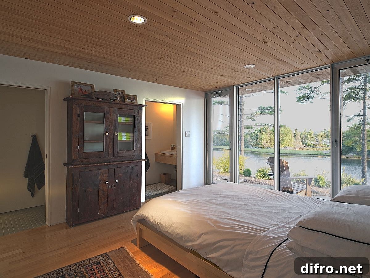 Bedroom interior with wood ceiling and floor