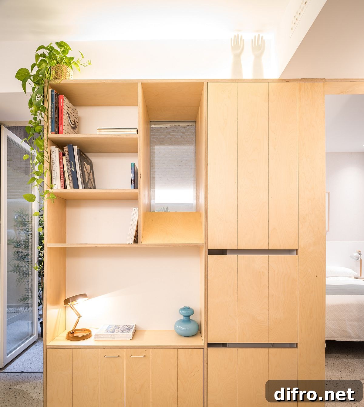 Birch plywood decor throughout the apartments add warmth to an otherwise neutral space