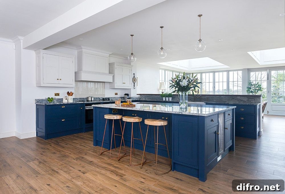 Spacious white and blue kitchen adaptable to many styles