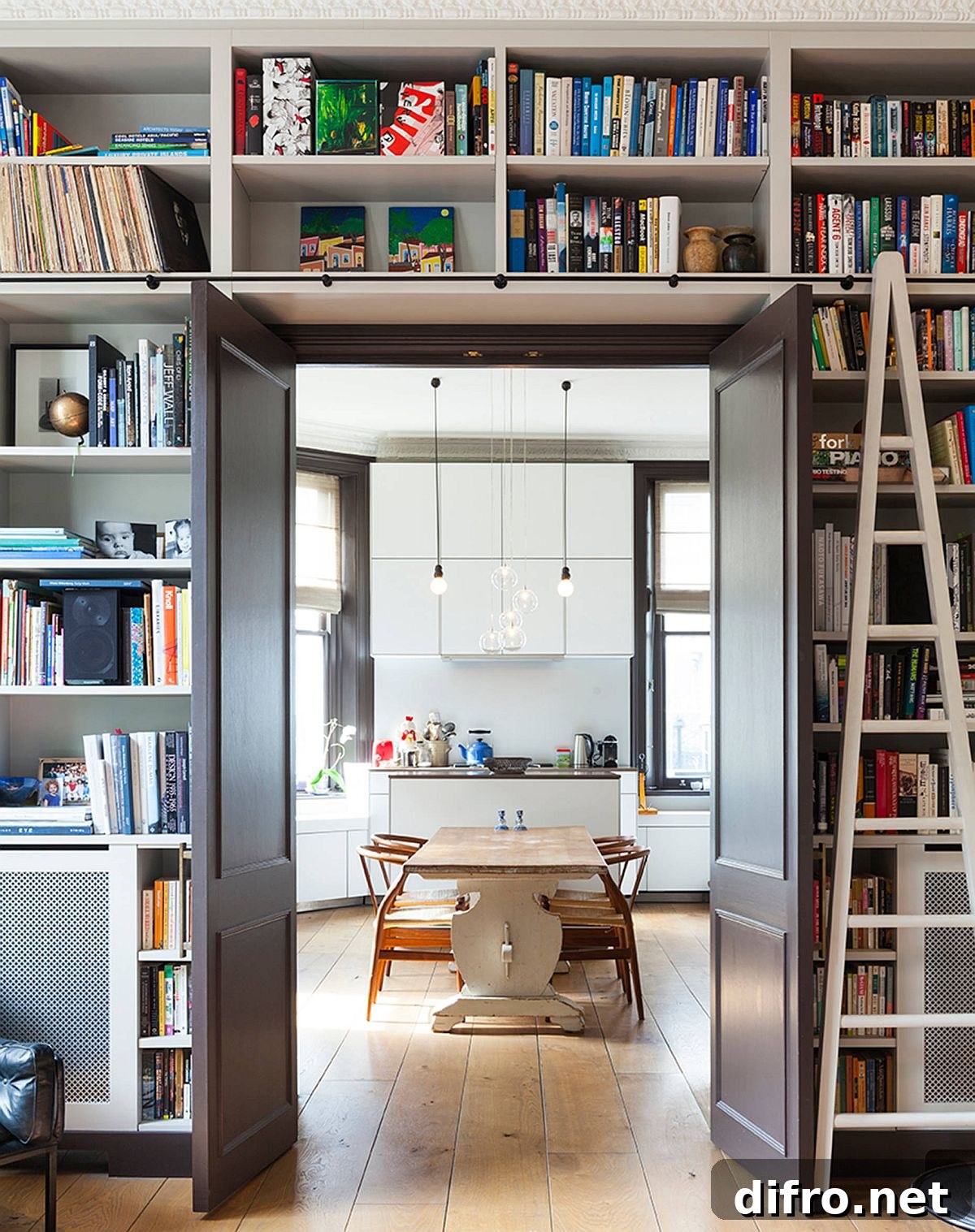 Built-in shelves around a doorway separating kitchen areas