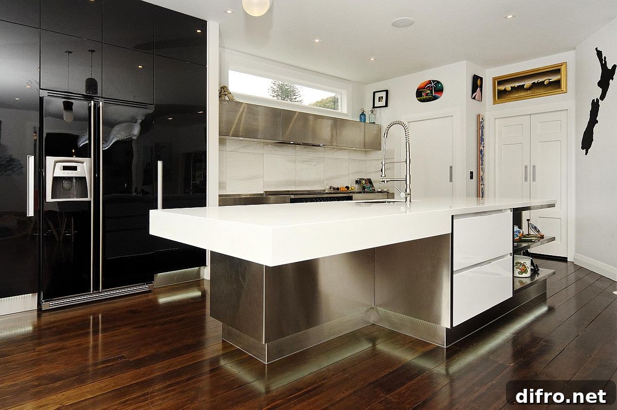 Contemporary white kitchen with high-gloss black appliances