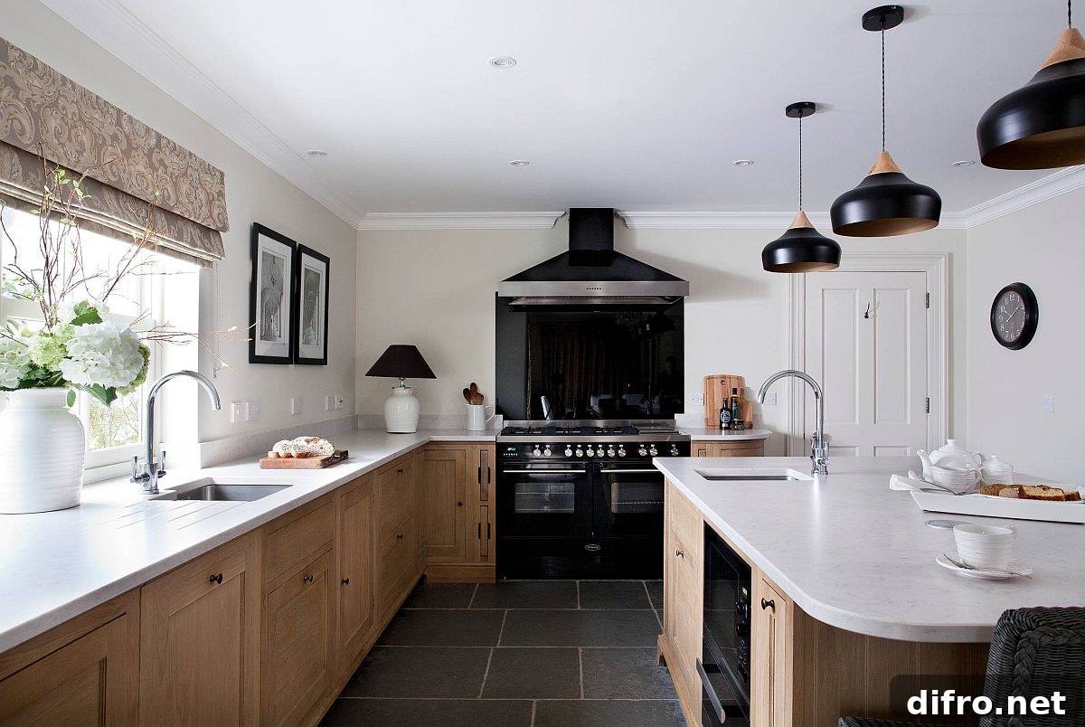 Black pendants accentuate a black kitchen range