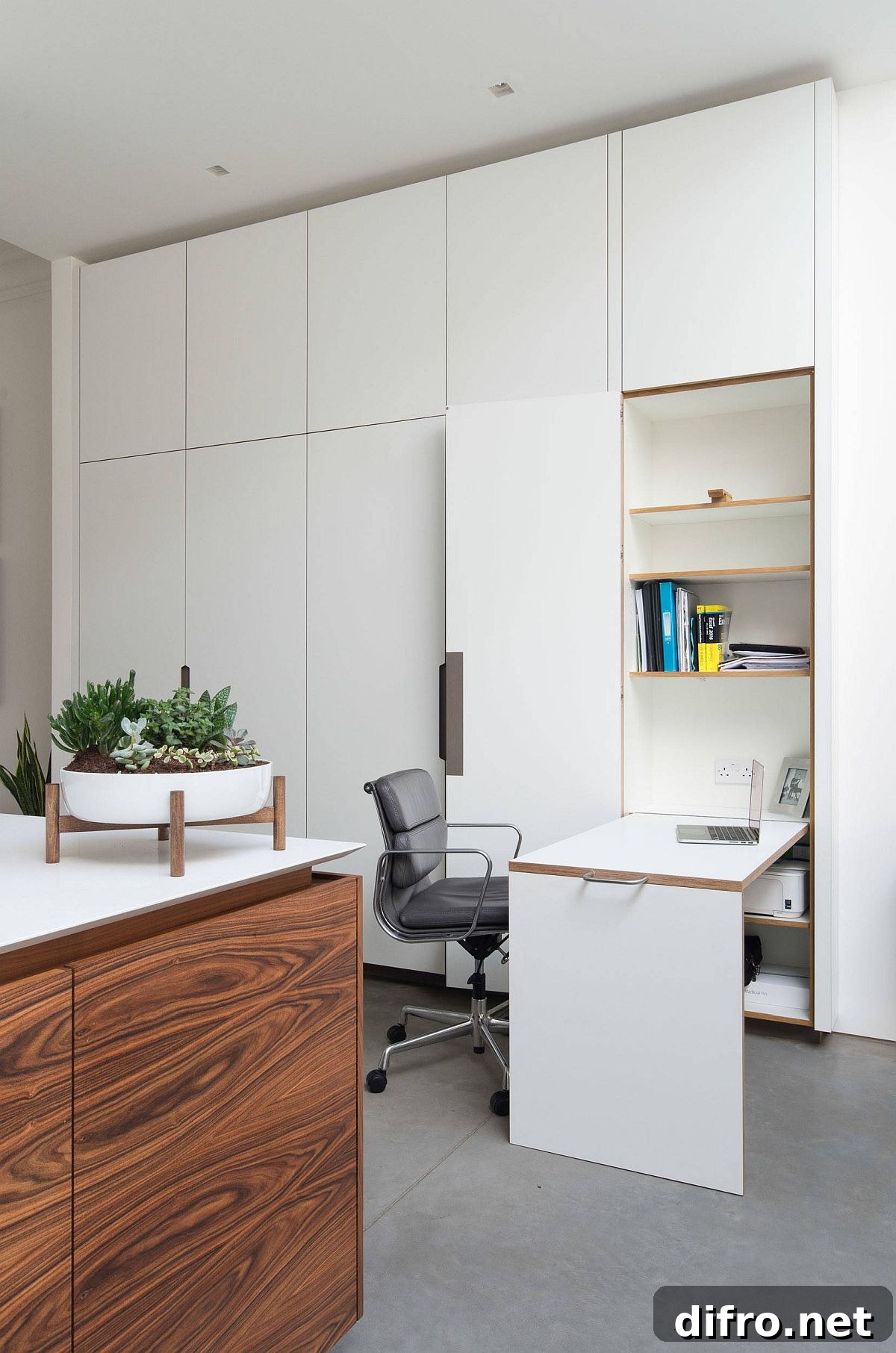 Folding desk that disappears into the wall