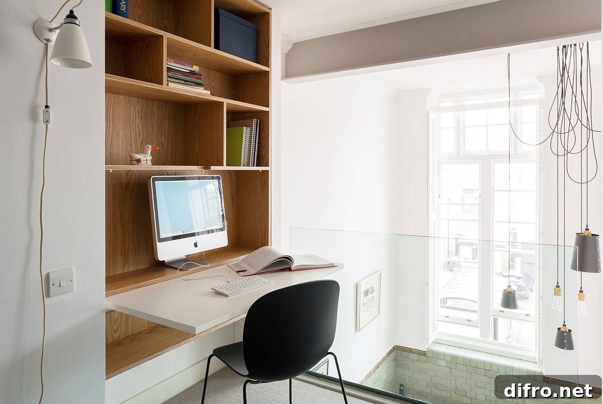 Home office in staircase landing with folding desk