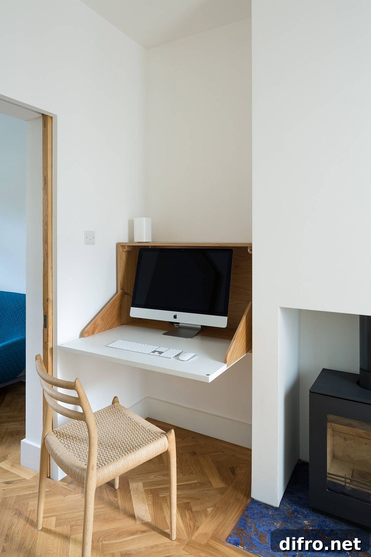 Small niche turned into workspace with folding desk