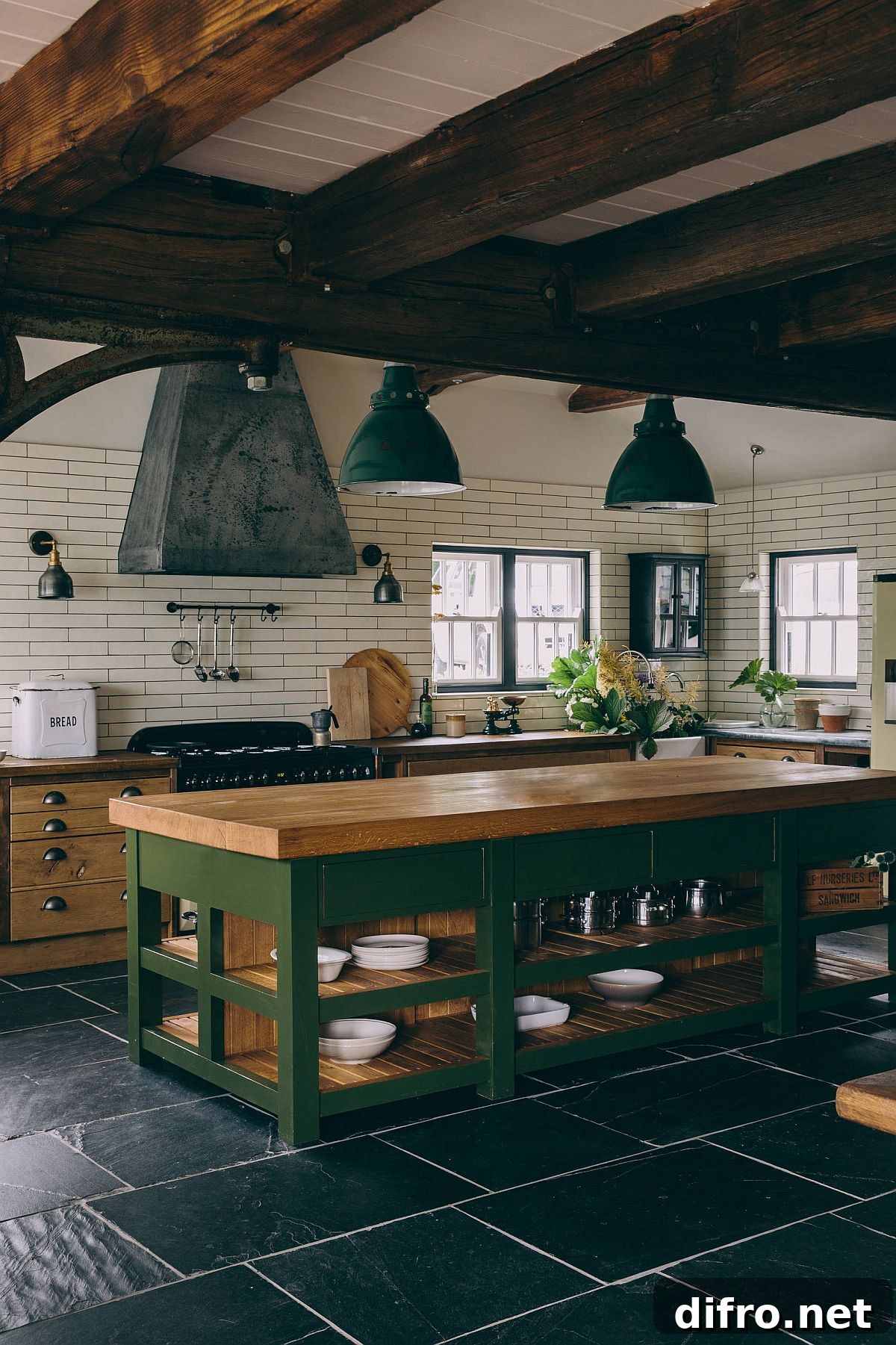 Rustic kitchen using green accents with wooden countertops and ceiling beams