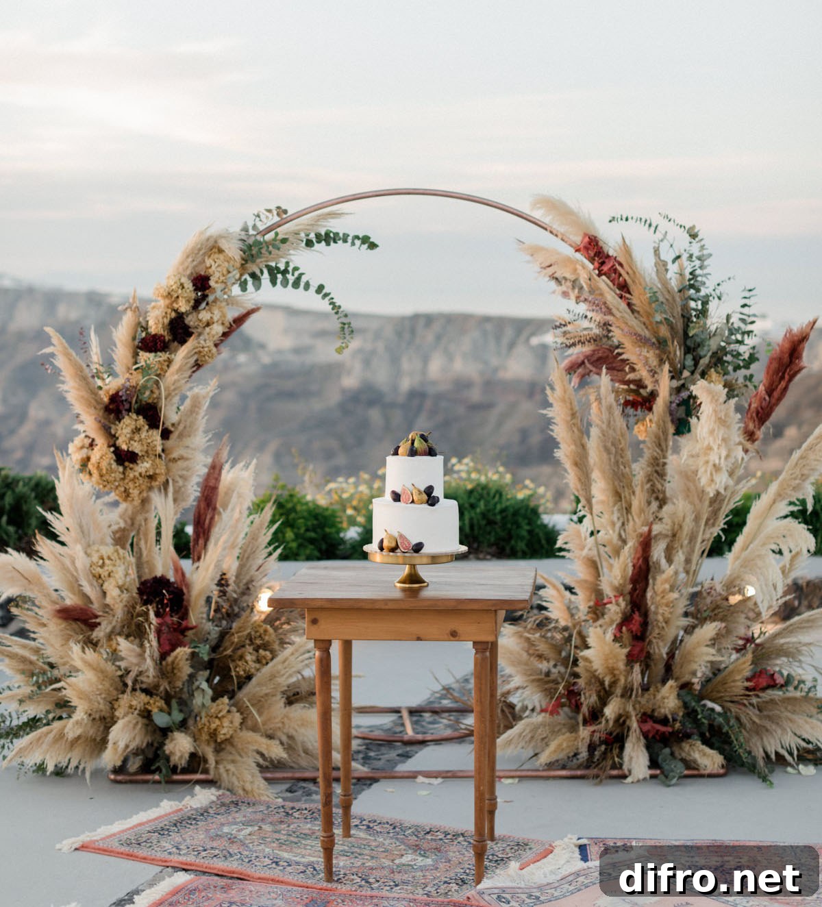 Pampas grass arch at cliffside wedding
