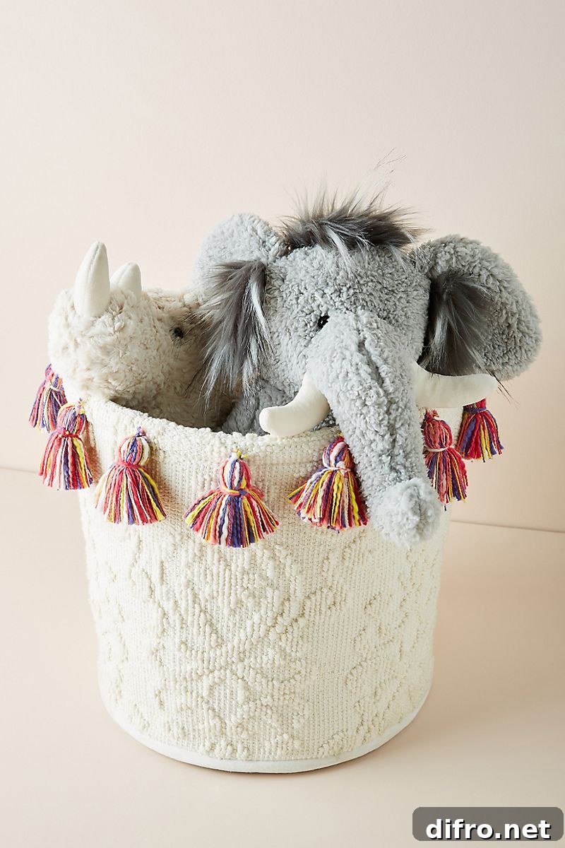 Tasseled storage basket for kids' room
