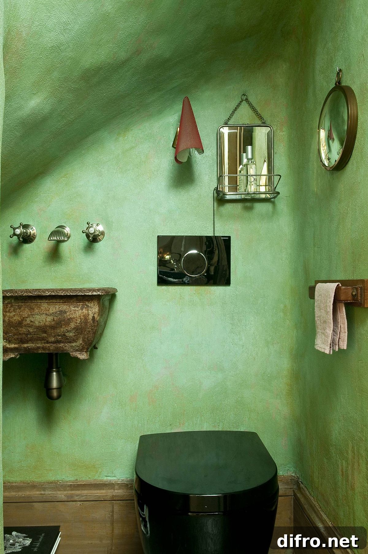 Eclectic powder room with textured green walls