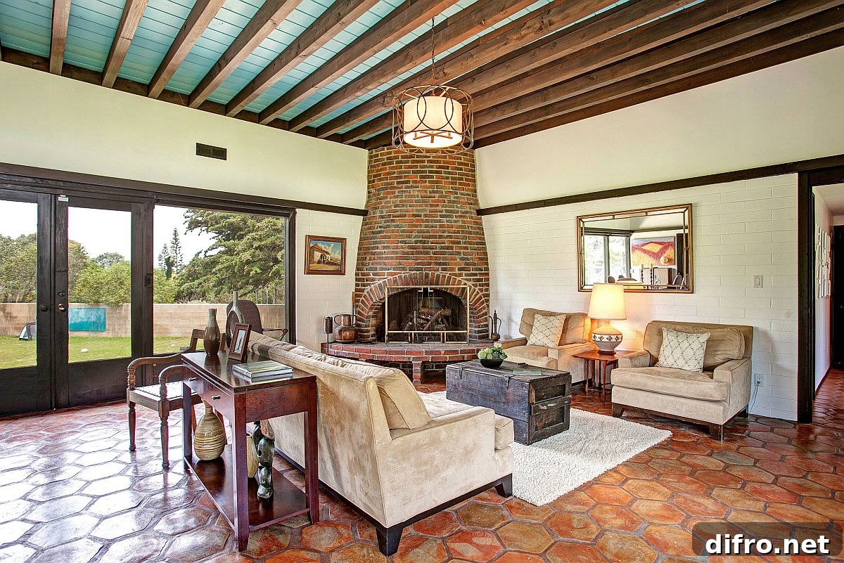 Mid-century living room with Mediterranean touches and terracotta floor