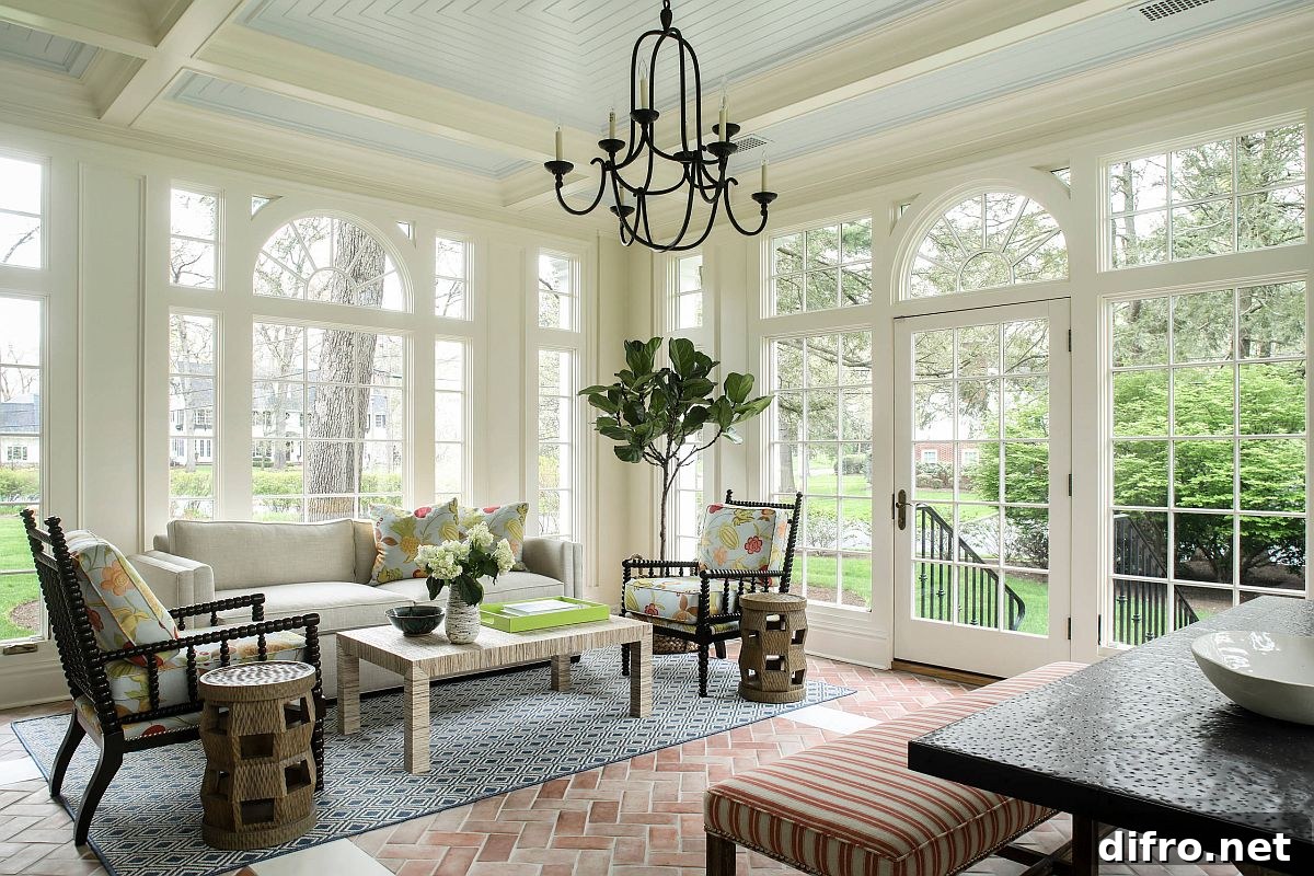 Light-filled living room in white with terracotta-tiled flooring