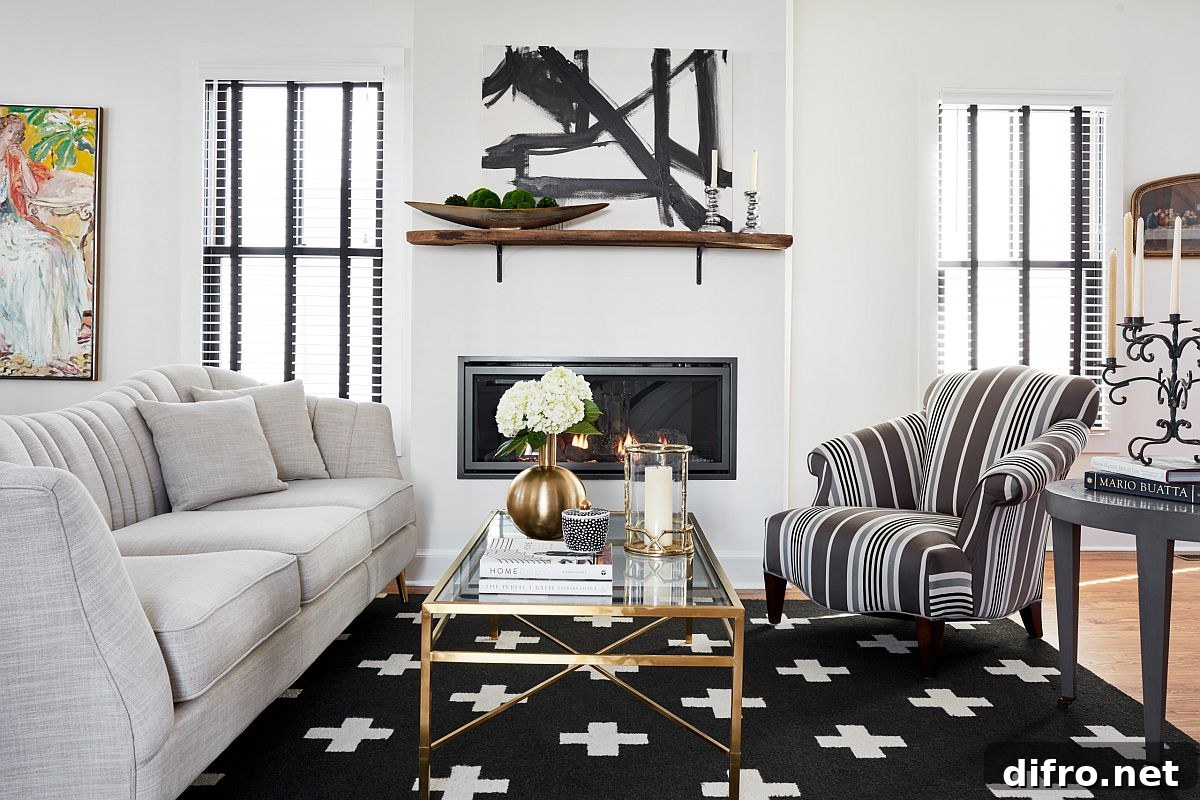Rug and striped chair add contrast to white living room