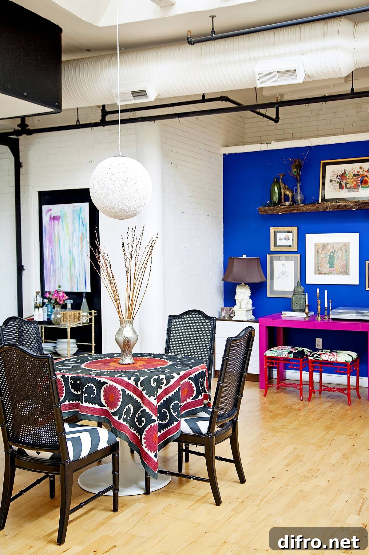 Blue and hot pink corner workstation in dining room