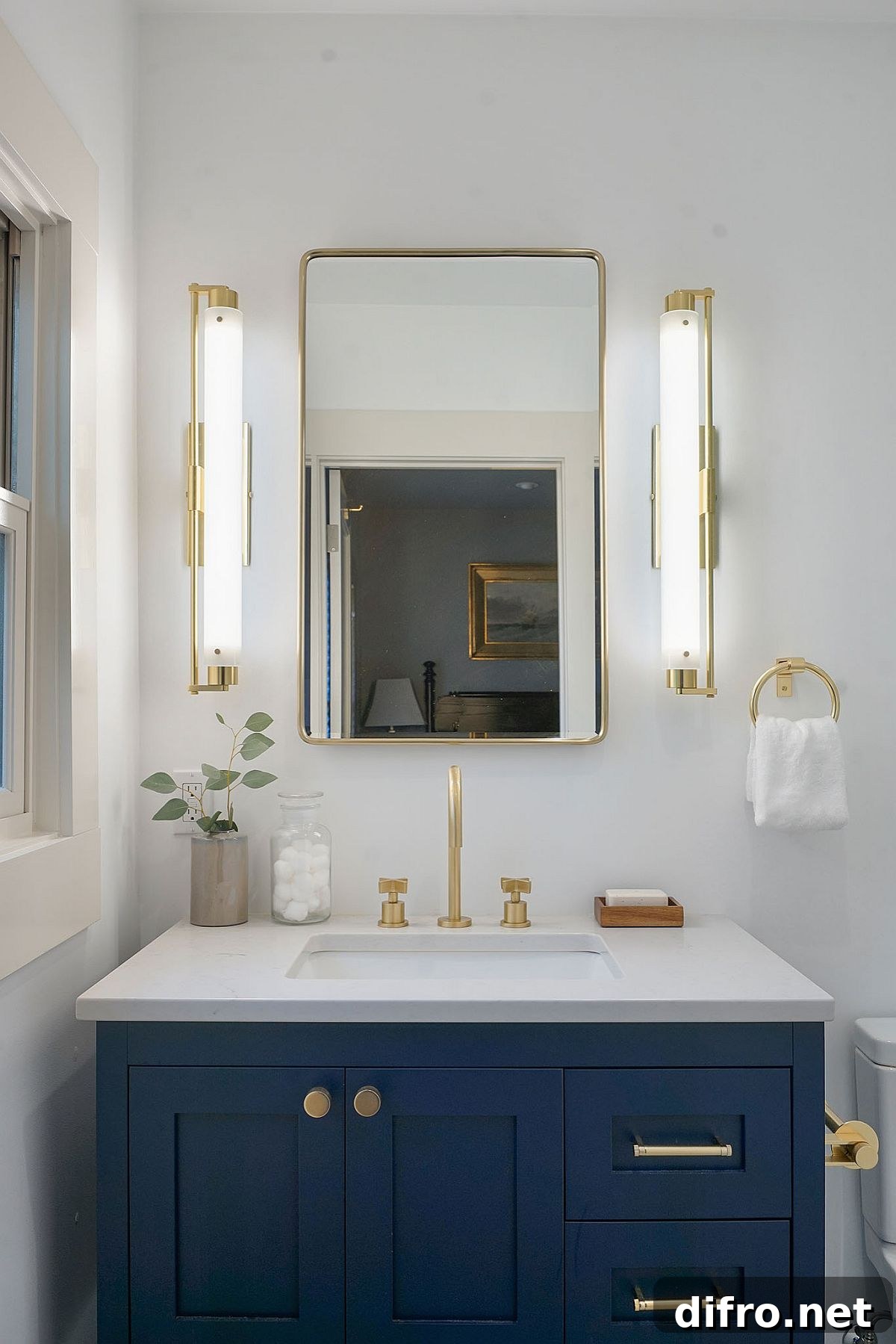 Blue vanity with gold accents