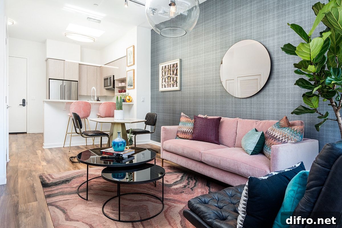 Gorgeous pink and gray living room with multi-colored accent pillows