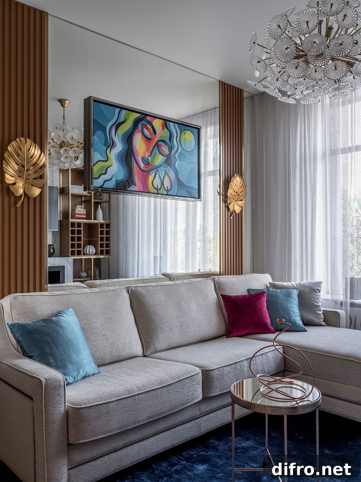 Using accent pillows in multiple hues gives the modern living room a brighter vibe