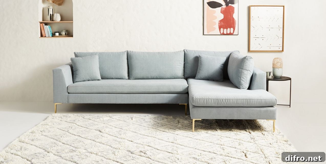 Ice blue sofa in white room