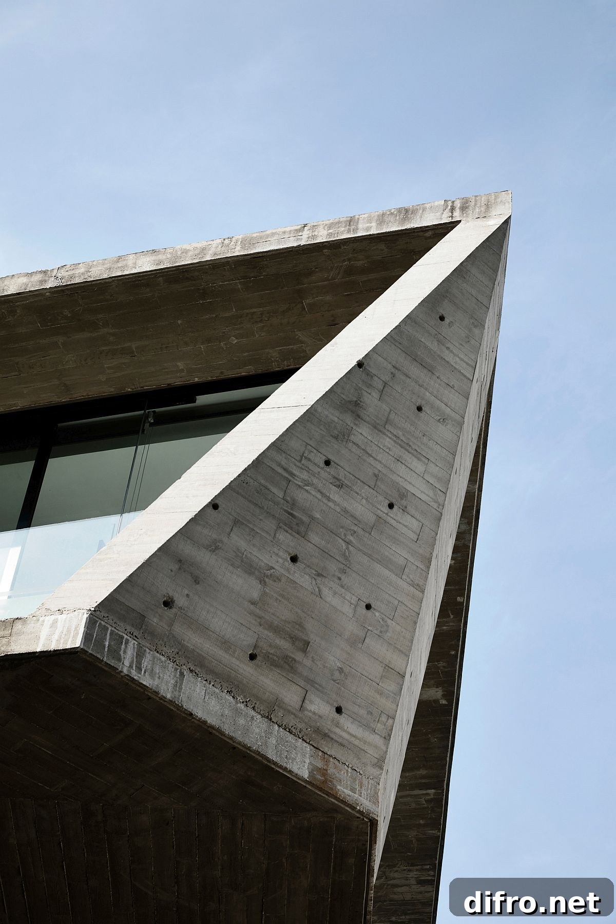 Geometric upper level of the house gives it a facade that is exceptional