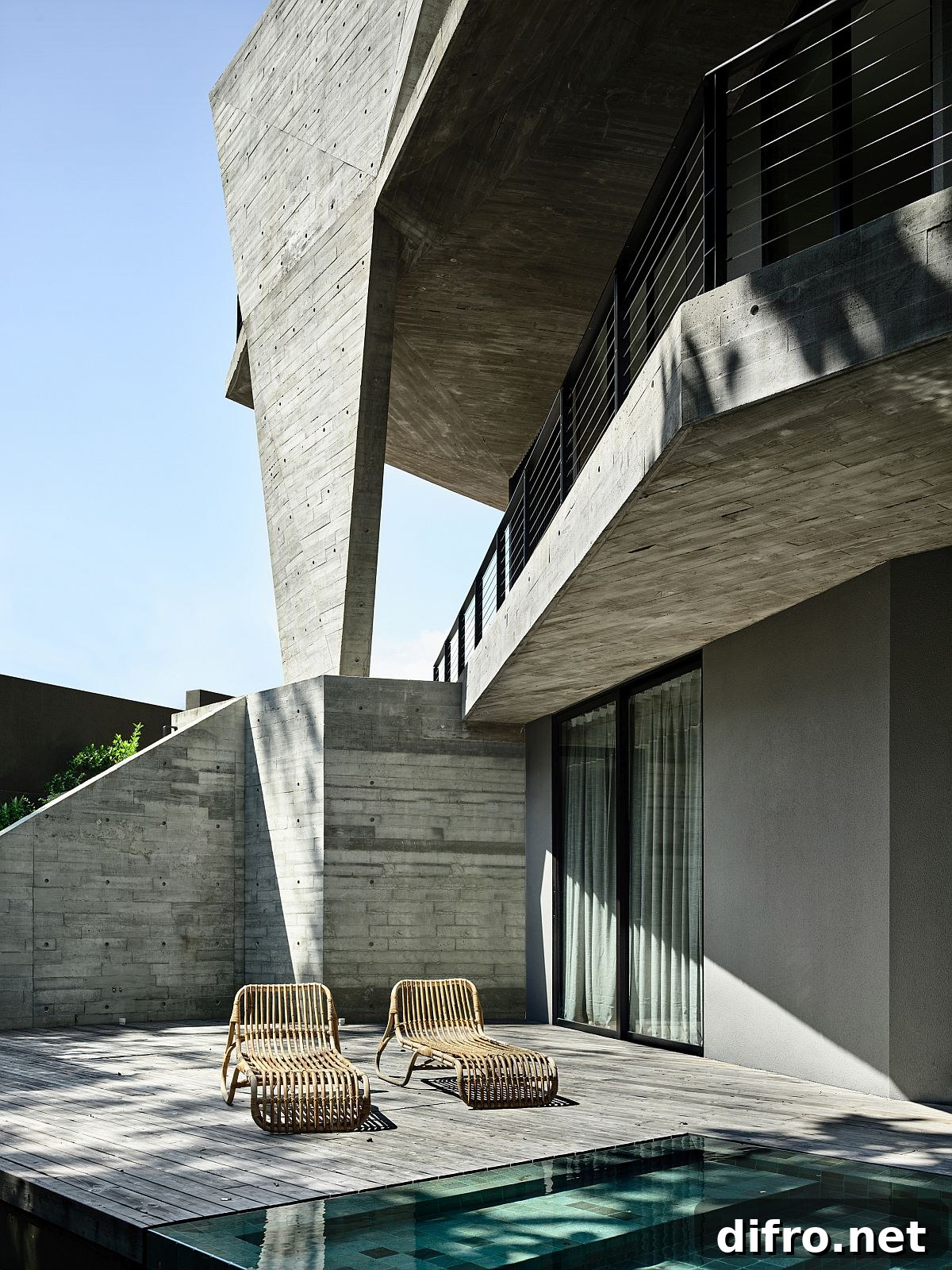 Minimal and simple deck of the house next to the pool