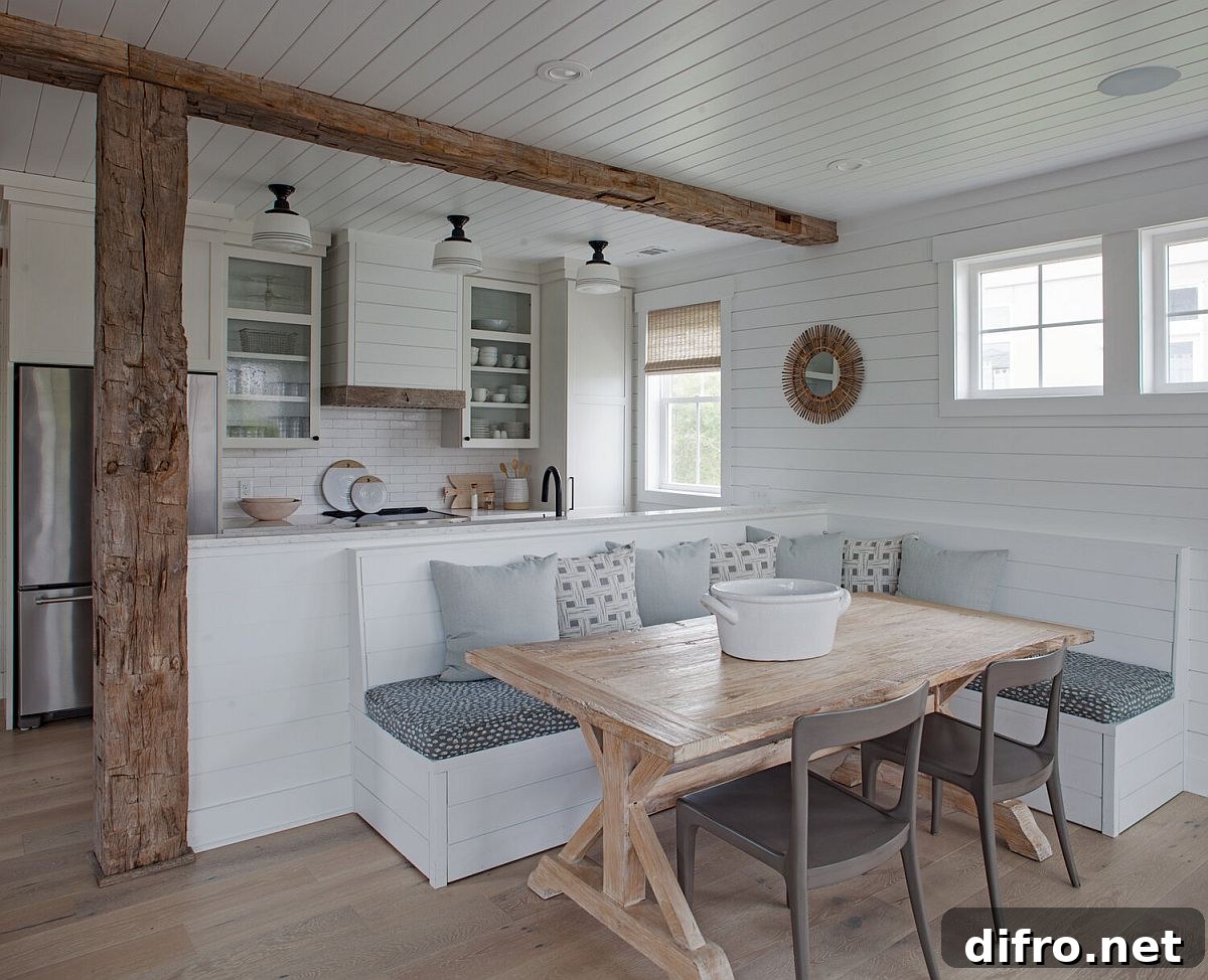 Banquette seating in beach-style dining room