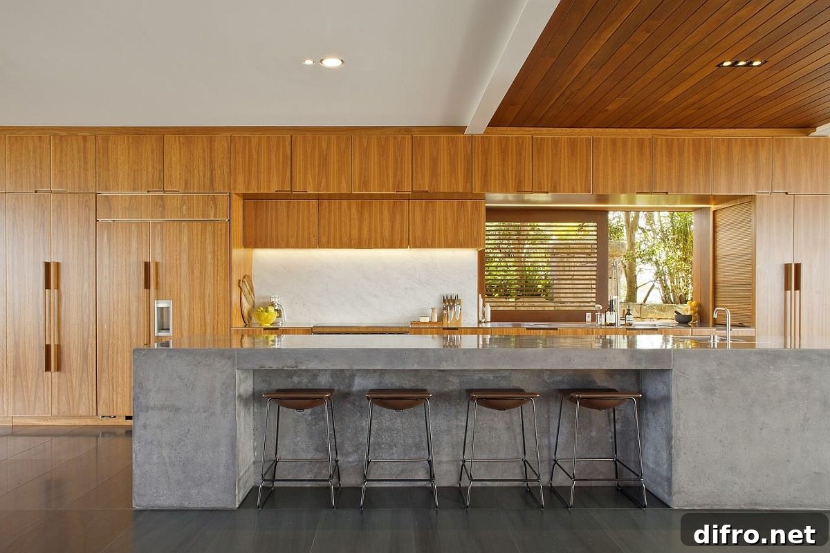 Kitchen with a large concrete island