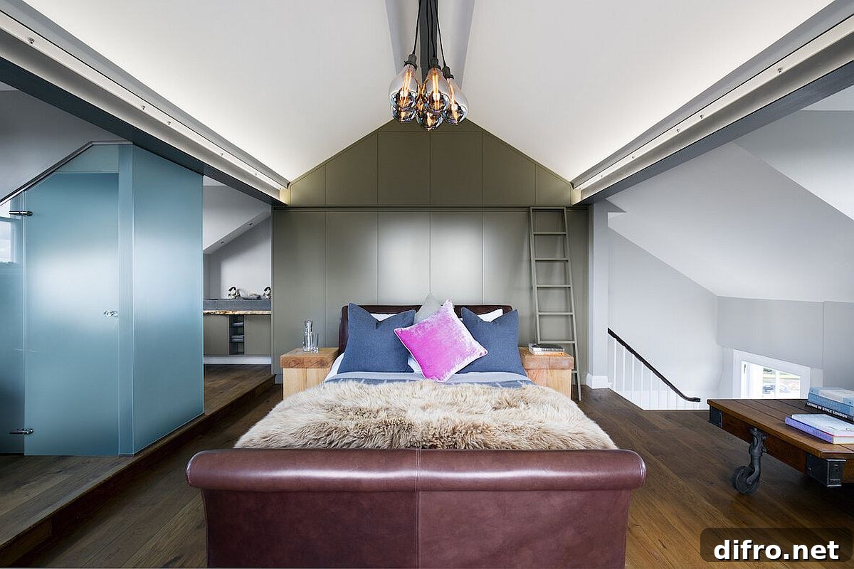 Stunning loft-level master suite with bespoke shelves and brick walls