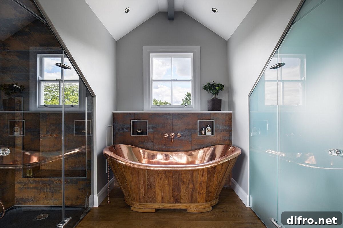 Copper and oak roll-top bathtub inside the master suite with multiple finishes