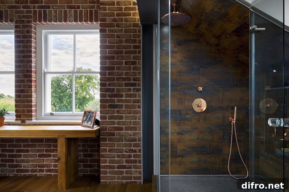 Wood, brick and glass sit next to one another inside this lavish master suite