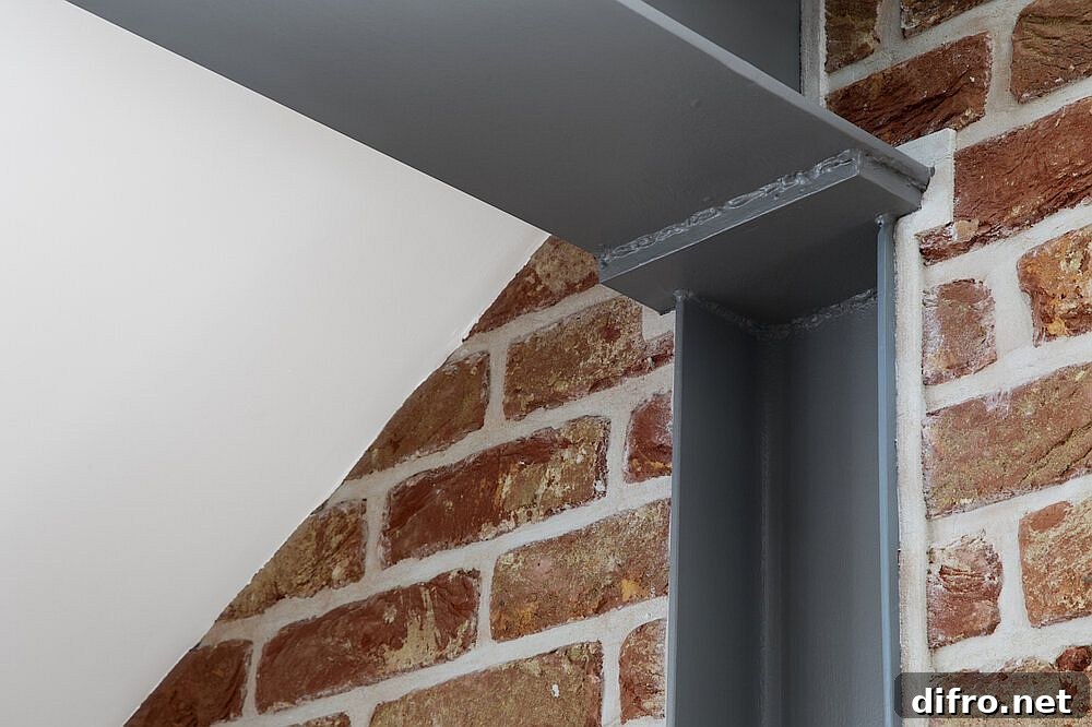 Ceiling stainless steel beams with LED lighting inside the master suite