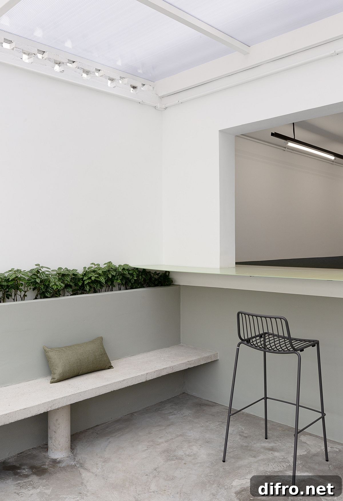 Natural light pouring into the dining area with touches of greenery