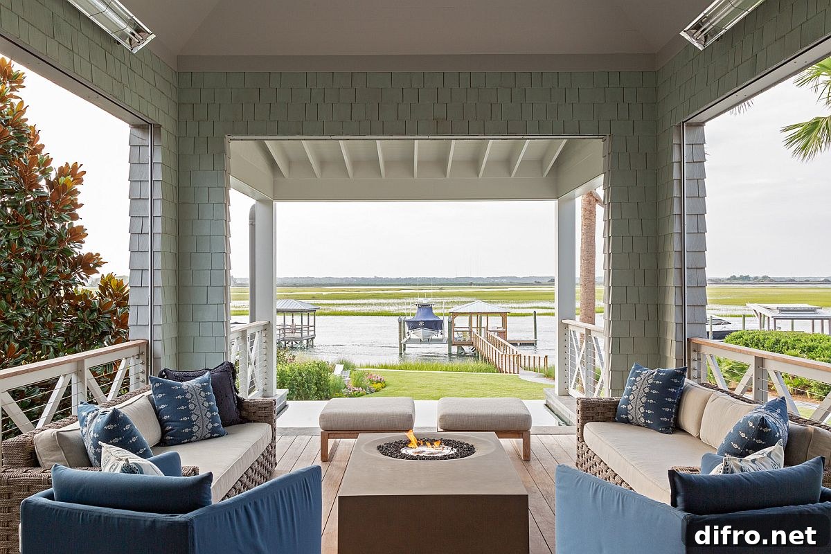 Modern porch with fireplace and blue sofas